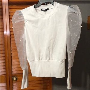 White long sleeved pearl top